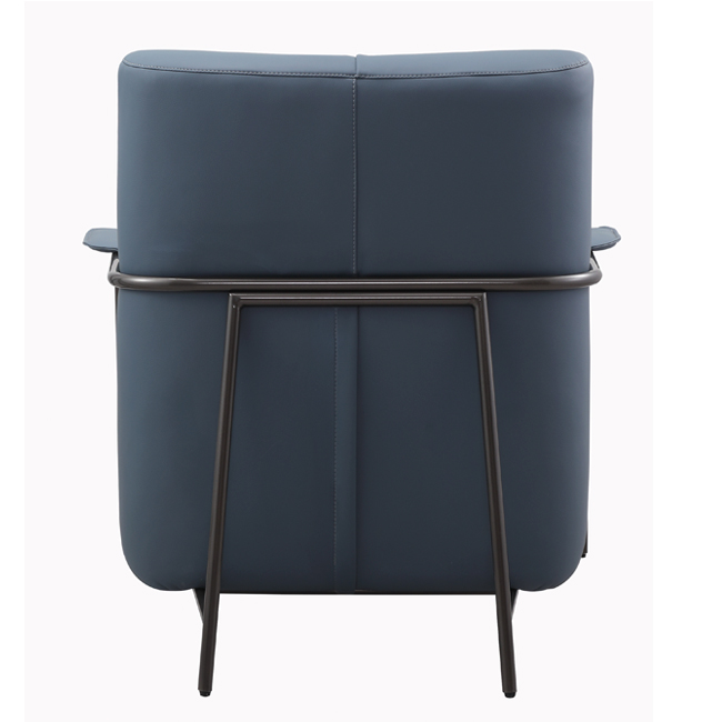 Contemporary lounge chair with soft blue upholstery, cushioned armrests, and curved black metal frame – designed for comfort in upscale hospitality or commercial spaces