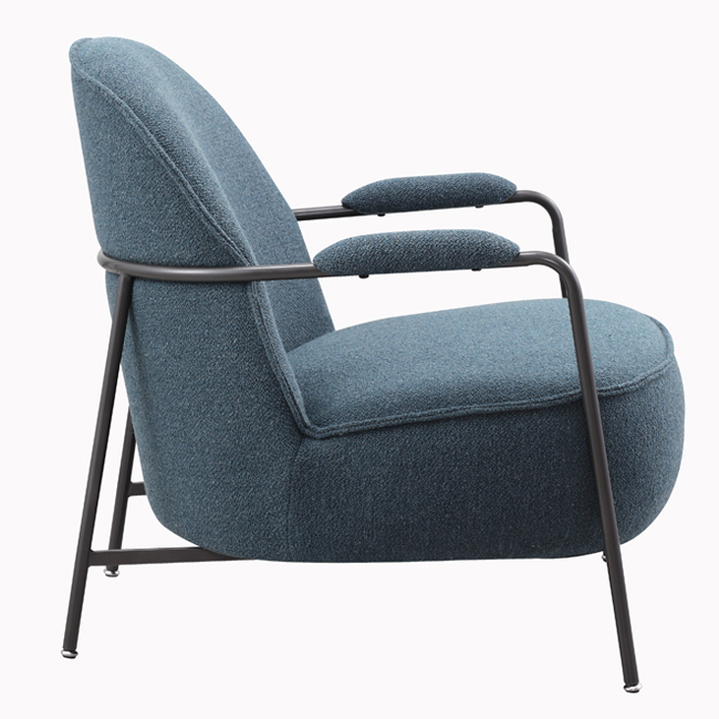 Modern blue lounge chair with curved backrest, textured upholstery, and cushioned metal armrests – a durable, commercial-grade seating solution ideal for commercial venues including hotels, pubs, gaming rooms, hospitality lounges, waiting areas, lobbies or reception areas